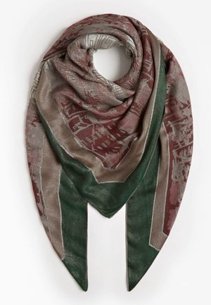 Large triangular scarf with woven geometric and floral patterns in muted red, beige, and green tones, draped with pointed ends hanging.