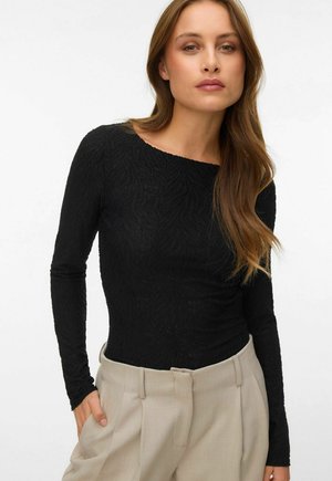 - Bluzka z długim rękawem