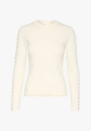 Krem pulover z dolgimi rokavi v oprijetem dizajnu, z okroglo izrezom in dekorativnimi kovinskimi gumbi ob rokavih. Gladka tekstura.