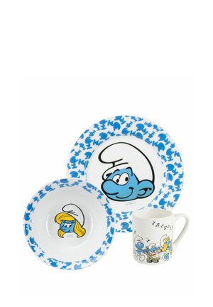 Children’s dish set with two plates and a mug featuring blue Smurfs characters and musical notes on a white background.