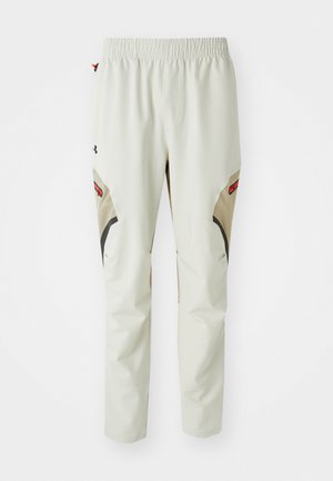 Under Armour UNSTOPPABLE - Tracksuit bottoms - summit white/city khaki/black