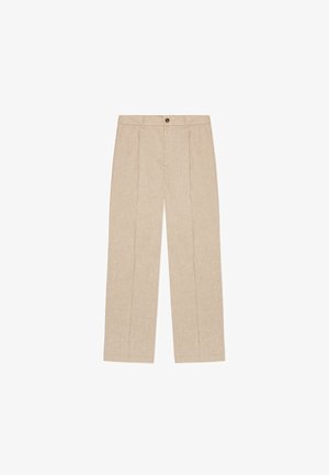 Bézs vászonnadrág egyenes szabással, két elülső hajtással, elöl gombos záródással és mindkét oldalon zsebekkel.