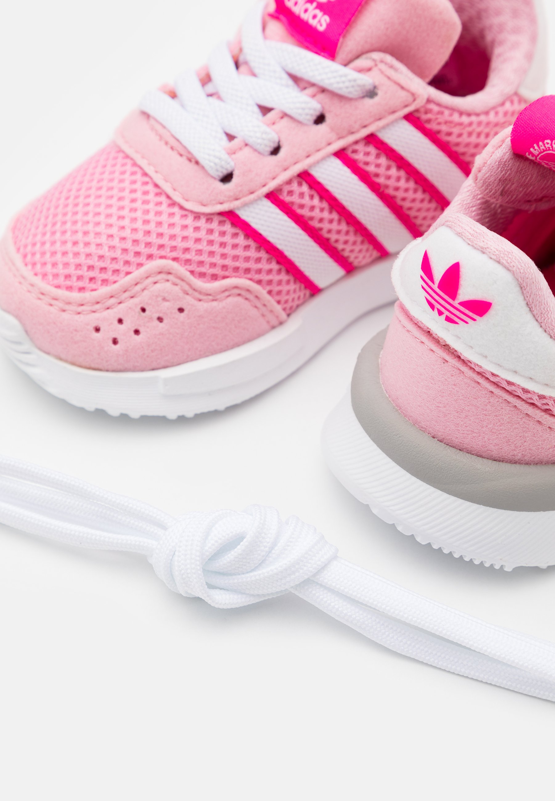 light pink adidas running shoes