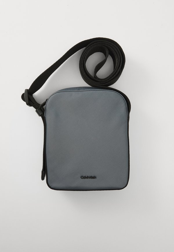 EASE REPORTER  - Cross body bag - turbulence2