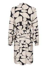Robe à manches longues avec des formes abstraites noires et beiges, des manches élastiques, une taille cintrée et un tissu texturé, vue de dos.