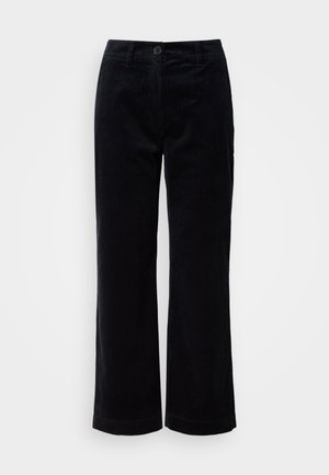 Pantalons droit en velours côtelé noir avec fermeture à bouton et à glissière, passes de ceinture et poches latérales sur un fond blanc.