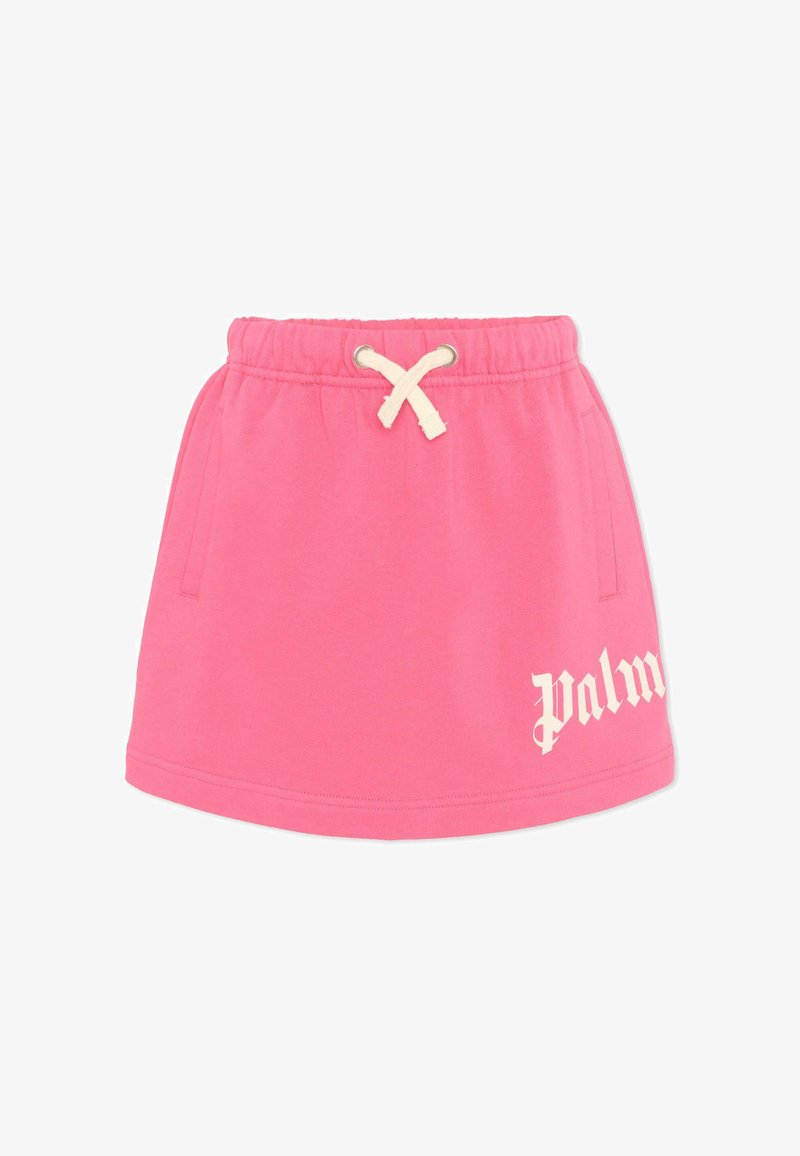 Jupe en coton rose avec taille élastique et cordon blanc, poches latérales, et texte blanc "palm" sur le côté inférieur droit.