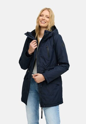 Navy blue insulated parka jacket with a drawstring waist, zippered front, multiple pockets, and a detachable hood. Soft fabric texture.