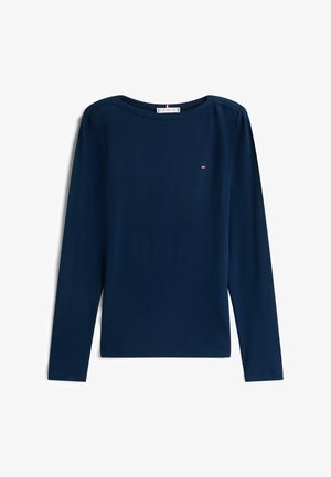 Camisa de manga larga azul marino con textura acanalada, presenta un escote amplio y un pequeño logotipo en el pecho. Diseño sencillo y entallado.