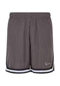Short de sport gris avec bordure noire et blanche à l'ourlet et petit logo signature blanc sur le bas à droite.