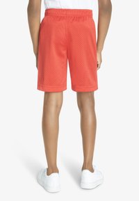 Nike Sportswear ESSENTIAL - Shorts - university red