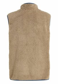 Veste sans manches en polaire beige avec col montant, tissu doux texturé et bordure bleu marine le long des emmanchures et du bord inférieur.