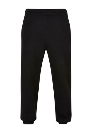 Pantaloni de trening negri, dintr-un material moale, cu talie elastică, picioare înguste și manșete la glezne. Fără modele sau accente vizibile.