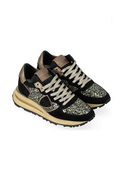 Black sneakers with glittery upper, gold accents, and chunky sole. Features lace-up design and contrasting textures.