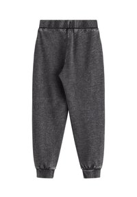 Joggers grigi in maglia con una trama morbida, vita elastica e polsini elasticizzati alle caviglie, caratterizzati da un sottile motivo mélange.