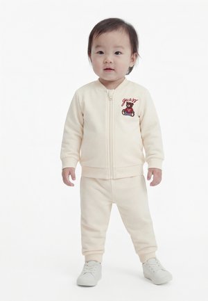 Guess BABY PANTS SET - Pantalon de survêtement - cream white