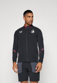 Castore FEYENOORD ROTTERDAM LEAGUE MATCHDAY ANTHEM JACKET - Klub merchandise - caviar/tomato