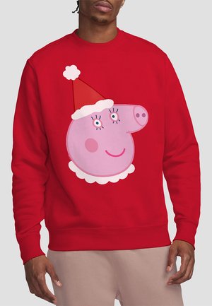 Rotes Sweatshirt mit einem großen rosa Schweinecharakter, der eine Weihnachtsmütze, einen weißen Kragen und Augen mit Wimpern trägt, zentral auf der Vorderseite platziert.