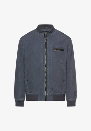 Veste bomber bleue à fermeture éclair, avec col, poignets et ourlet côtelés, et une poche poitrine zippée sur le côté gauche.