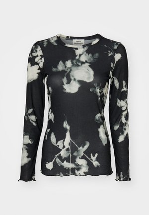 Long-sleeve black top with a ribbed texture, featuring a white floral pattern and scalloped edges. Tag visible at the neck.