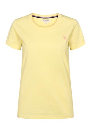 Žuta pamučna majica kratkih rukava s okruglim izrezom i malim vezanim logotipom na prsima. Mekana tekstura i standardan kroj.
