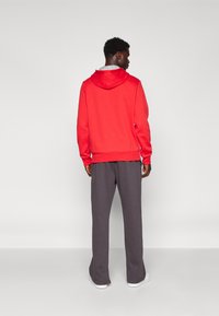 Champion ICONS STRAIGHT CUFF PANTS TONAL LOGO - Spodnji deli trenirk - anthracite