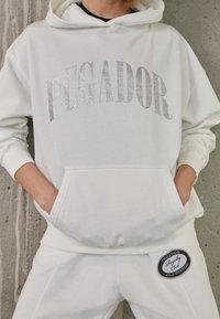 Pegador Jersey con capucha - white