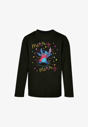 Zwarte lange mouwen shirt met een afbeelding van een blauw personage met een open mond, omringd door kleurrijke stippen en de tekst "merry merry."