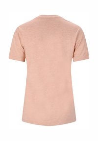 T-Shirt mit kurzen Ärmeln aus weichem Pfirsichstoff. Rundhalsausschnitt, lockere Passform und subtile Textur mit glatter Oberfläche.