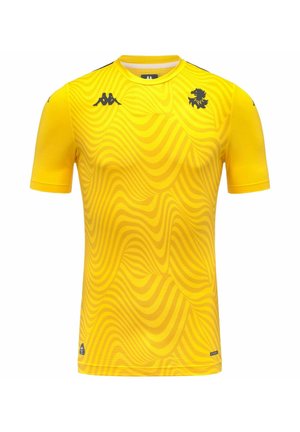 Maglia sportiva gialla a maniche corte con motivo ondulato, emblema nero di leone sul petto e loghi neri Kappa su petto e maniche.