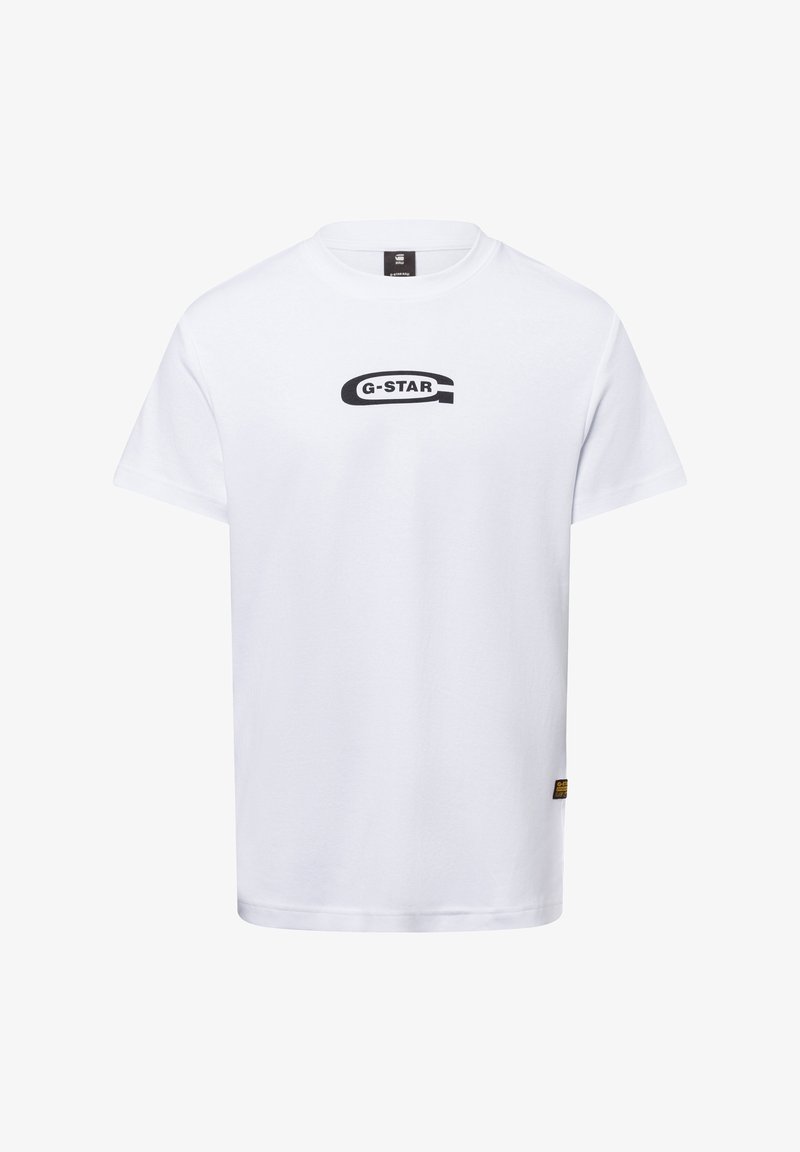 Camiseta de algodón blanca con un logotipo negro de "G-STAR" en el centro, mangas cortas, cuello redondo y una pequeña etiqueta amarilla en la parte inferior izquierda.