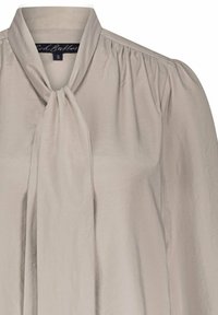 Light beige blouse with a tie neckline, soft texture, gathered sleeves, and a smooth finish. Features a subtle sheen. Size S.