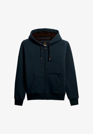 Marineblaues Zip-Hoodie mit Fleece-Futter, ausgestattet mit einer Kapuze mit Kordelzug, zwei Fronttaschen und gerippten Bündchen sowie Saum. Goldene Akzente am Reißverschluss.