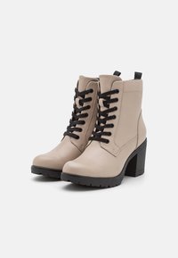 Marco Tozzi Bottines à talons hauts - ivory