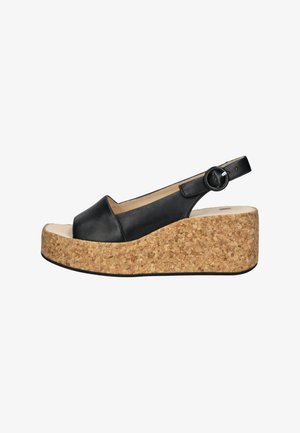 Zwarte leren slingback wedge sandaal met een ronde neus, kurken platform en verstelbare gespsluiting. Eenvormige textuur met een subtiele glans.