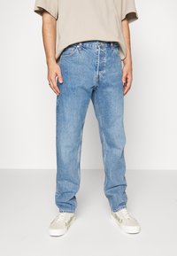 Weekday BARREL - Calças de ganga de corte afunilado - harper blue