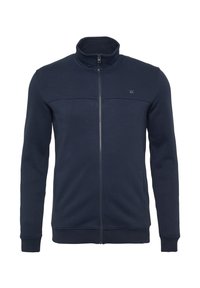 Marine blauwe zip-up sweatshirt met hoge kraag, zachte textuur, zijzakken en contrasterende stiksels langs de schoudernaad. Logo op de bovenste linkerkant van de borst.