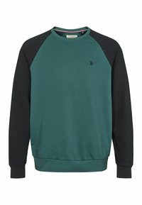 Zaļš apģērbs ar melniem raglanu piedurknēm, ribotām aprocēm un apakšmali, kā arī neliels izsist logo uz krūšu daļas. Mīksta auduma tekstūra.