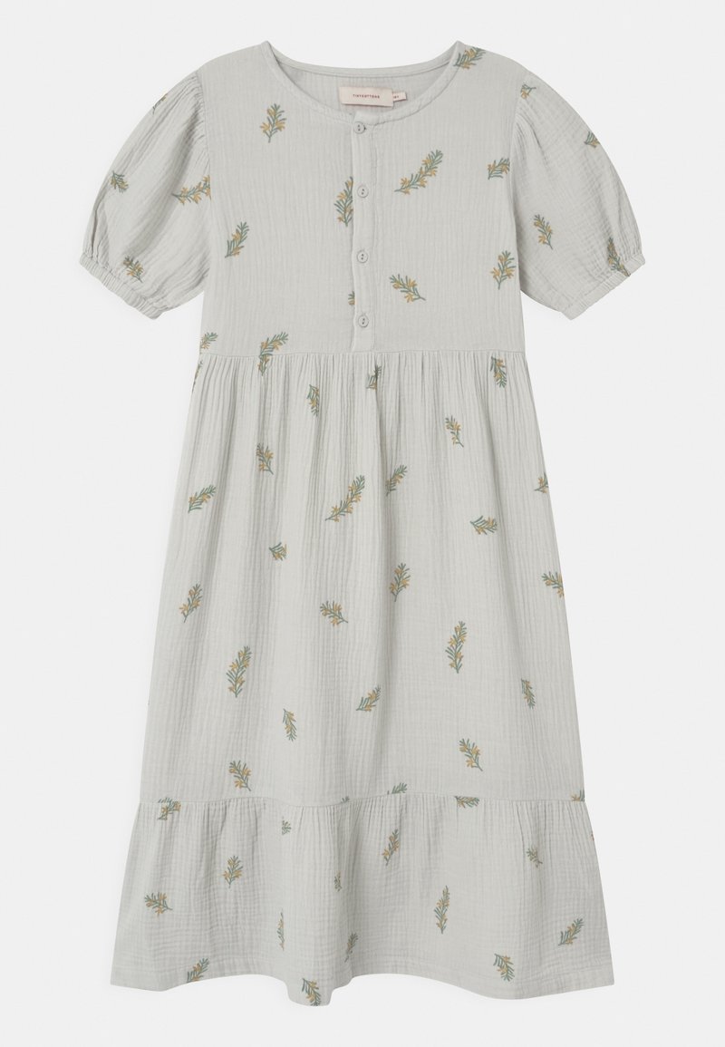 Ljust grå bomullsdräkt med korta puffärmar, knappfront, rynkad kjol och små gröna och gula blommönster broderade över hela.