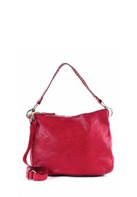 Red leather handbag with a soft, textured surface. Features a braided handle and an adjustable strap, secured with metal hardware.