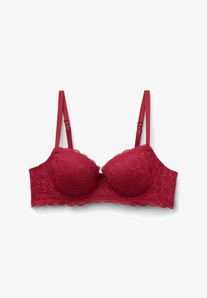 Red lace bra with padded cups and scalloped edges, featuring adjustable straps and an intricate floral pattern.