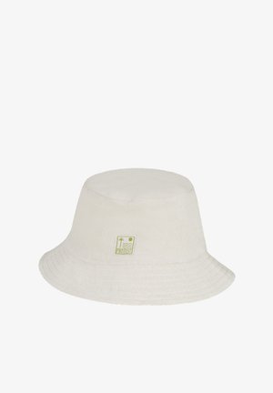 Kapelusz bucket w kremowym frotte, z płaskim wierzchem i szerokim, nachylającym się w dół rondem. Z przodu znajduje się zielona naszywka z logo.