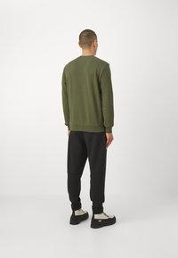 EA7 Emporio Armani TROUSER - Treniņtērpa apakšdaļas - notte