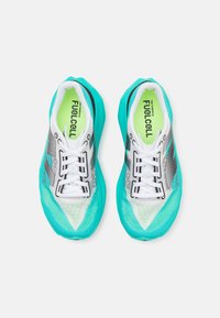 New Balance FUELCELL REBEL V4 - Road running shoes - green