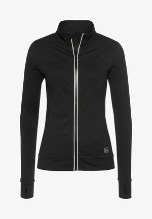 Schwarze Zip-Jacke aus glattem Stoff. Mit Stehkragen, langen Ärmeln mit Daumenlöchern und kontrastierendem weißen Reißverschluss.