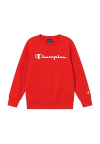 Czerwona bluza z długimi rękawami, okrągłym dekoltem i ściągaczami na mankietach. Na froncie znajduje się duże białe logo "Champion".