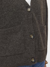 Dark brown wool cardigan with textured fabric, featuring two front pockets and four round buttons with a subtle design.