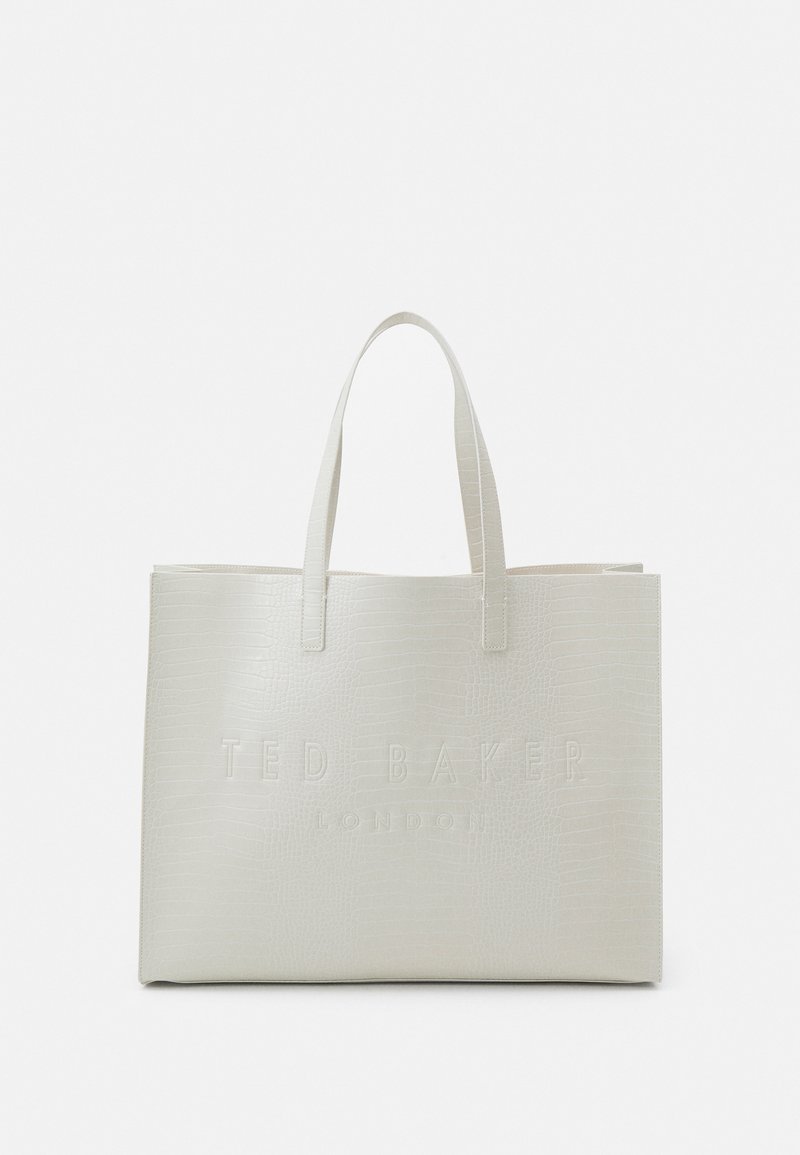 White crocodile-textured tote bag with two top handles. Features embossed "TED BAKER LONDON" logo on the front. Rectangular shape.
