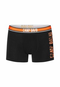 Boxer briefs neri realizzati in morbido tessuto, con un elastico arancione e bianco a righe e la scritta "CAMP DAVID" stampata in grassetto arancione sul lato.
