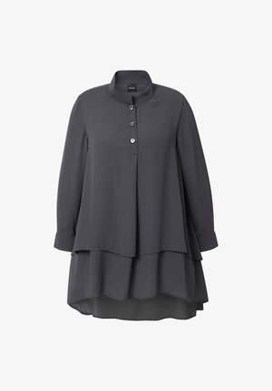 Dark gray long-sleeve blouse with layered hem, high collar, and three front buttons, made of lightweight fabric.
